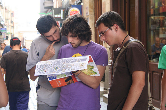tourists looking at a map